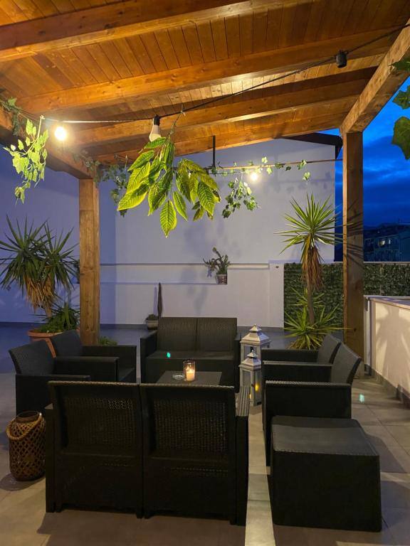 Terrace of b & b Jasmine in Santa Teresa di Riva, Sicily, at dusk
